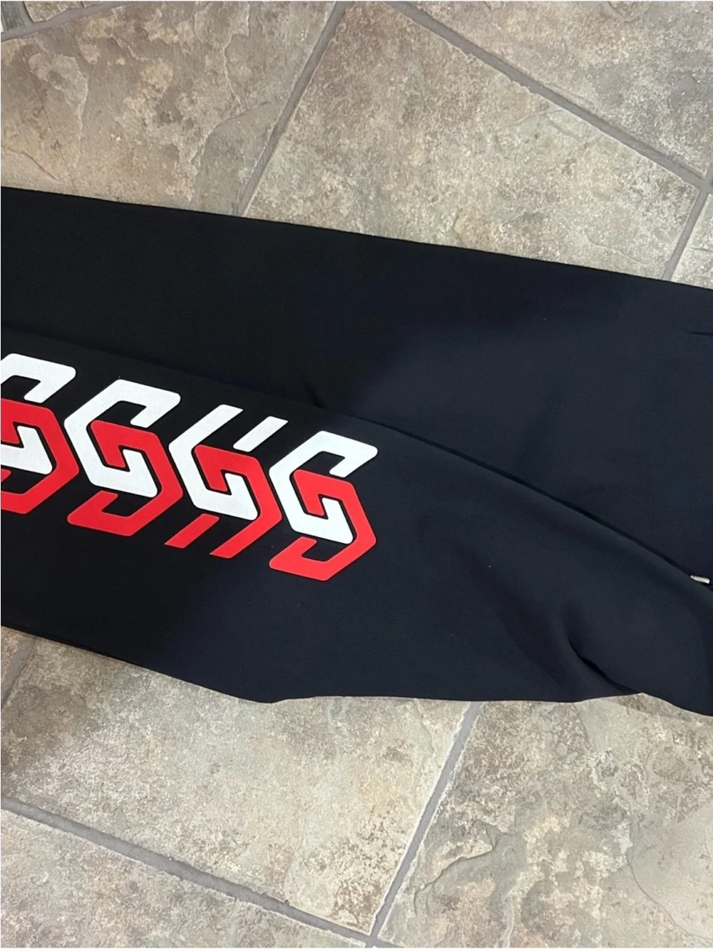 Men’s Gucci, cotton red/white logo sweatpants size XL fits small/medium NWT